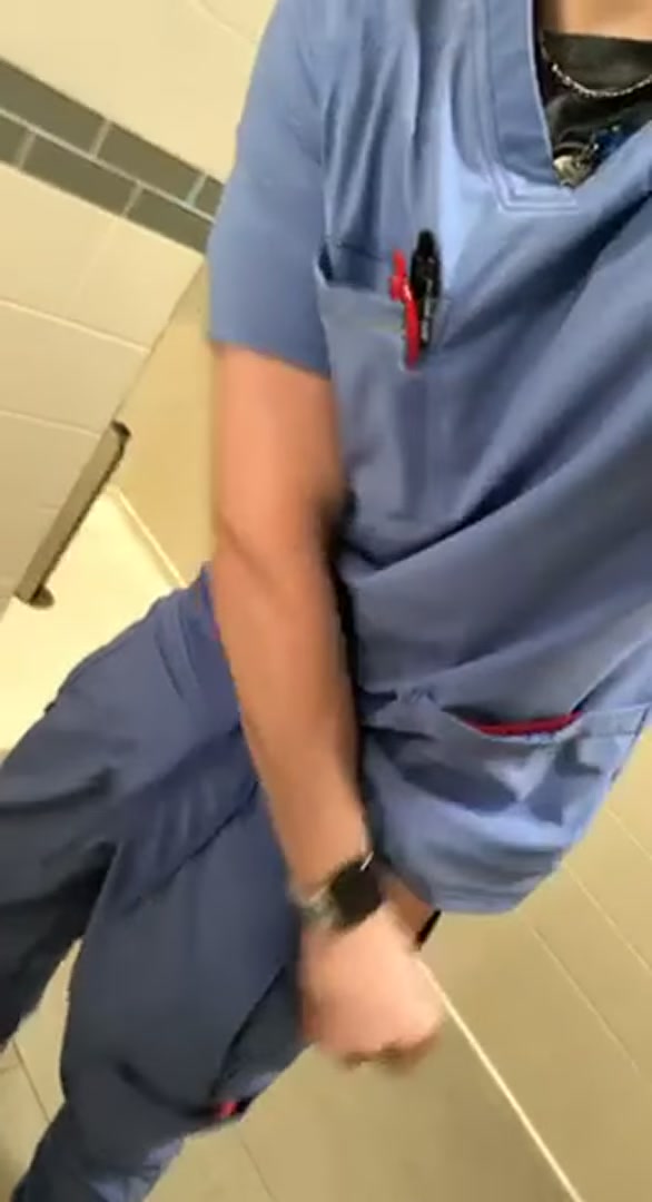 [24] Did you expect this to be hiding under my scrubs?