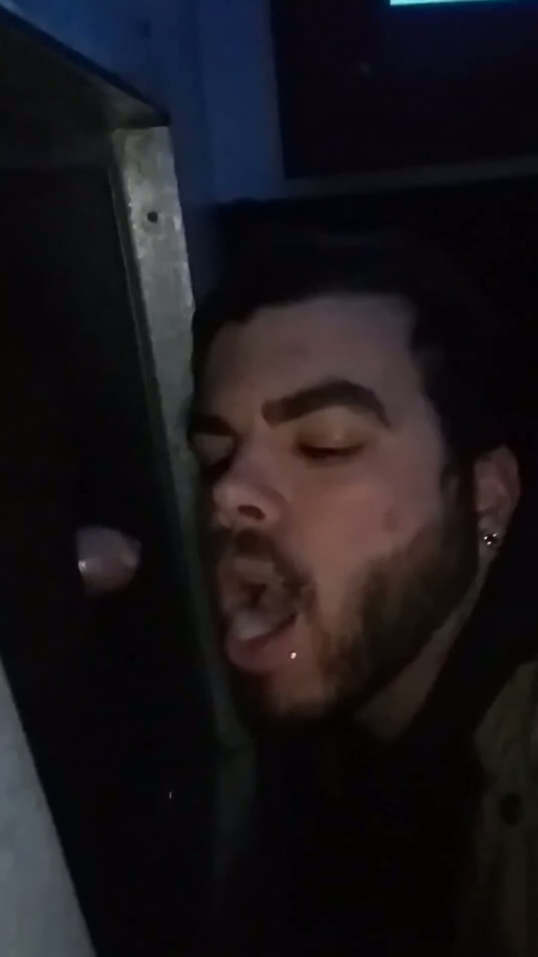 Swallowing a huge load at the glory hole