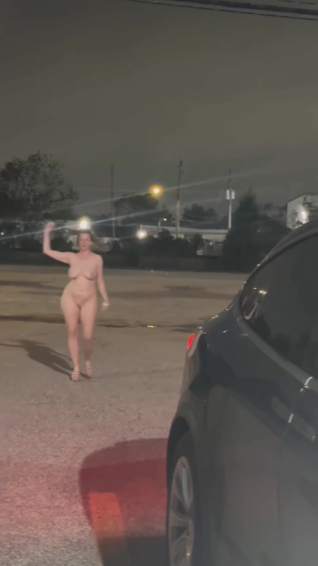 A little naked walk in the parking lot