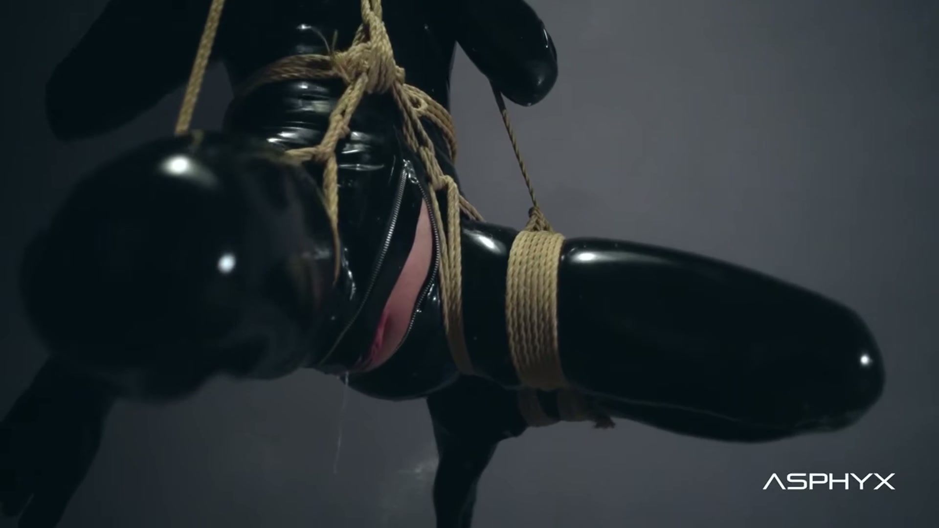 Rubberdoll Livy hanging in ropes