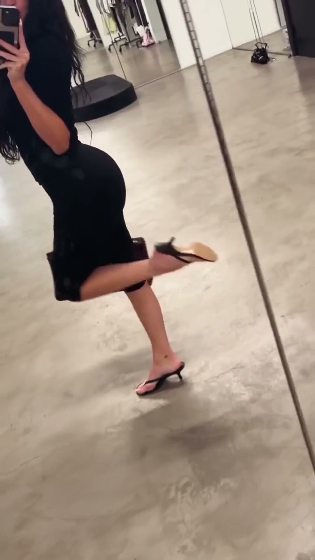 Kylie in black one piece zip up bodycon jumpsuit - IG Story May 2026
