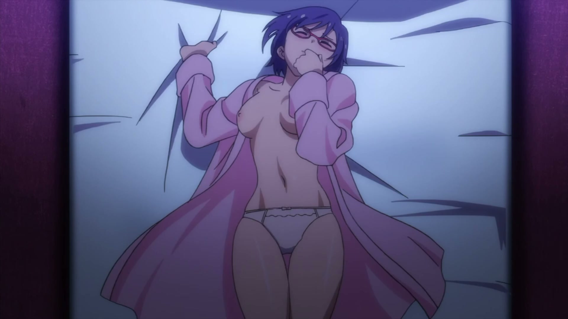 Blushing glasses babe squirming on the sheets while holding her tits