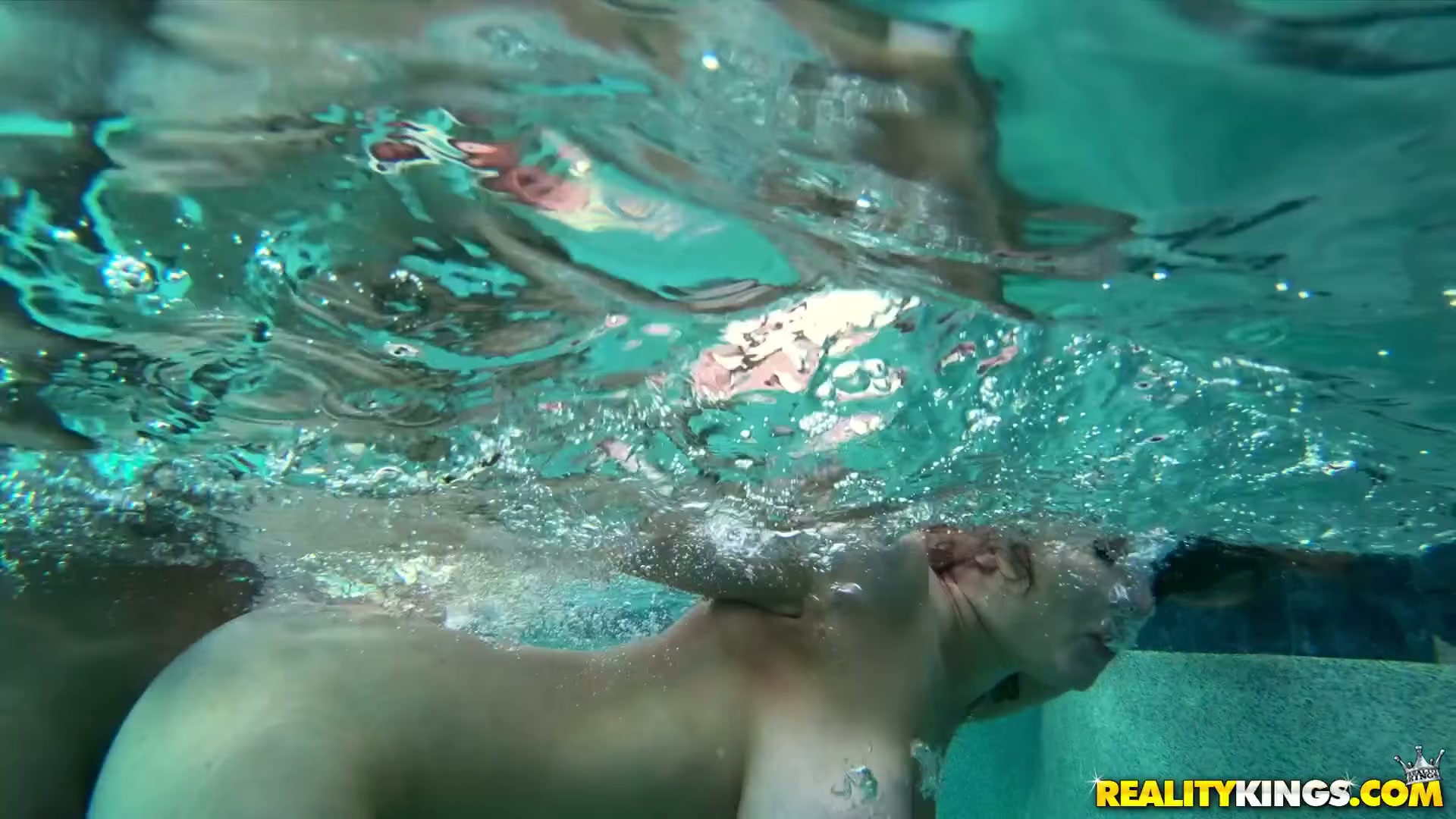 Pounding her while she tries to hold her breath under water