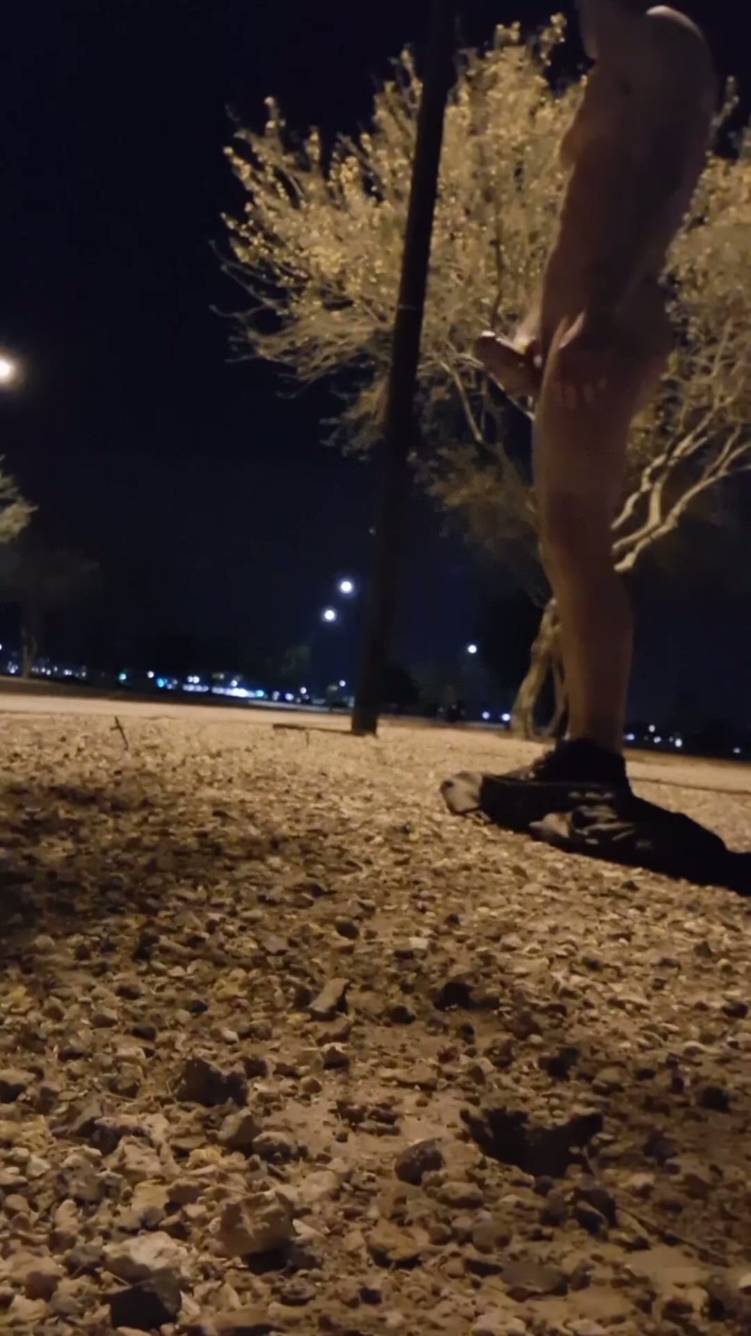 Stroking under the streetlight