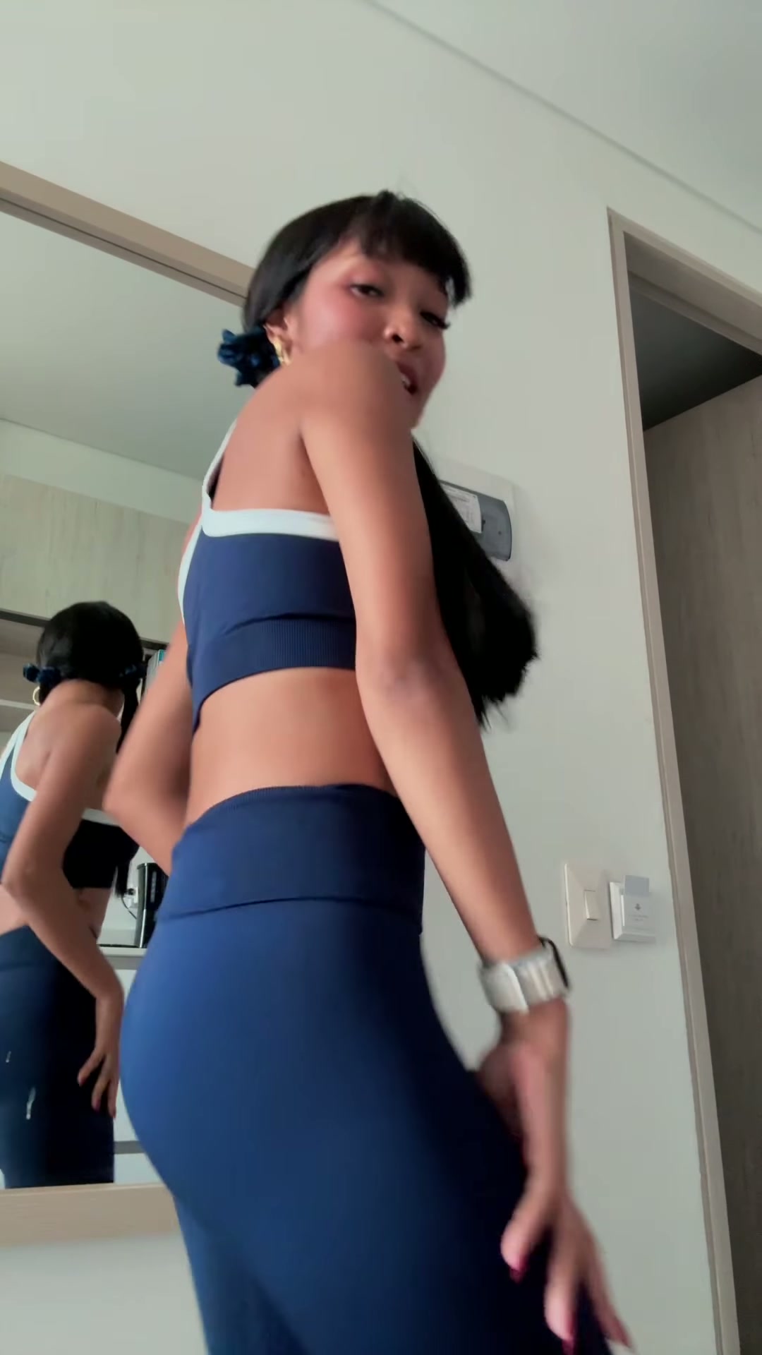 Just casually bending to show off my sports bra game