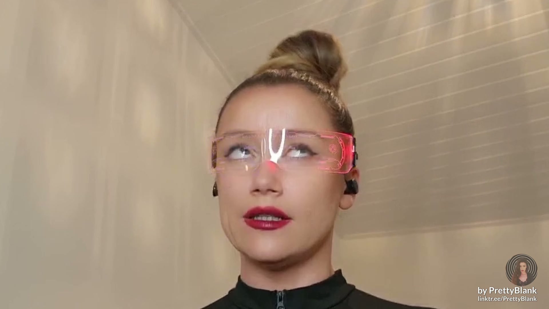 Twin betrayal: Lucy cunningly hypnotises her unsuspecting twin, Lily, using special glasses.