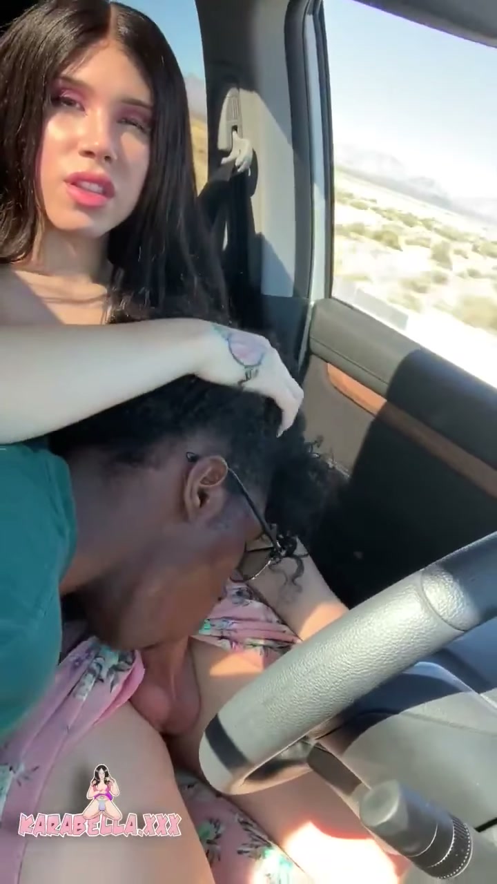 Karabella gets a blowjob while driving her car (gif)